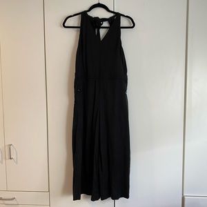 Anthropologie black jumper with tie back